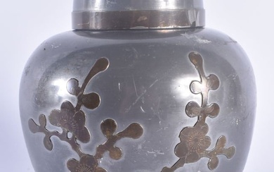 A LATE 19TH CENTURY CHINESE PEWTER TEA CADDY AND COVER decorated with foliage. 16 cm x 11cm.