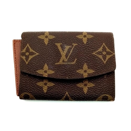 A LOUIS VUITTON wallet. Dimensions: 10 x 8 x 2 cm.