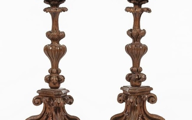 A Louis XIV Venetian boxwood candlesticks