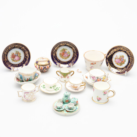 A MINIATURE PORCELAIN TEA SET AND A CABINET CUP AND SAUCER AND OTHER ITEMS.