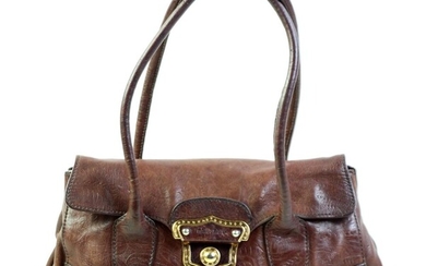 A MIU MIU TOOLED BROWN LEATHER SHOULDER BAG; with rolled handles, gilt metal adjustable clasp and studs, size 33 x 20 x 11cm, marks...