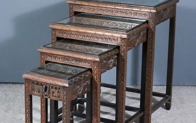 A Nest of Four Chinese Carved Wood Rectangular Occasional...