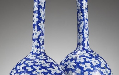 A PAIR OF BLUE AND WHITE 'ICE CRACK AND PRUNUS' BOTTLE VASES, 19TH CENTURY