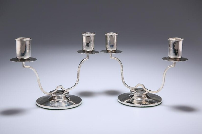 A PAIR OF GEORGE VI SILVER TWO-LIGHT CANDELABRA