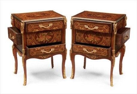 A PAIR OF LOUIS XVI STYLE GILT BRONZE MOUNTED COMMODES