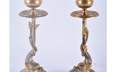 A PAIR OF REGENCY COUNTRY HOUSE SILVERED BRONZE CANDLESTICKS...