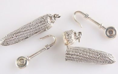 A PAIR OF SILVER NOVELTY VESTA CASES, import