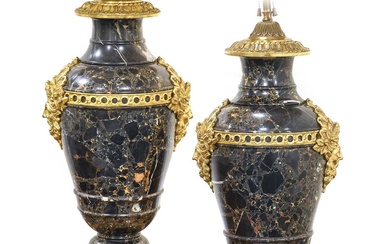 A Pair of Gilt-Metal-Mounted Variegated Grey Marble Lamp Bases, in...