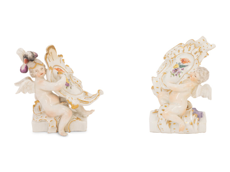 A Pair of Meissen Porcelain Figures of Putti with Cartouches