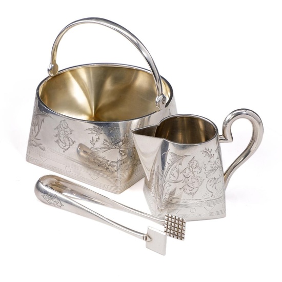 A Russian silver sugar and creamer set, engraved with flowers and foliage...