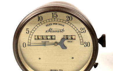 A Stewart Model 41A 30mph speedometer and an oiler