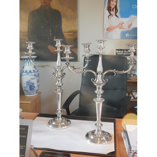A Superb Pair of Sterling Silver Three Branch Candelabra, we...