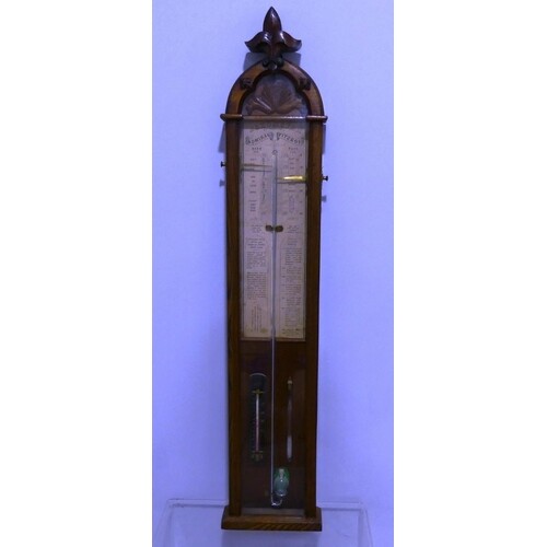 A Victorian 'Admiral Fitzroy' Barometer, in carved oak case,...