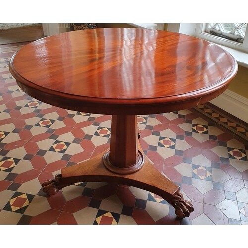 A Victorian Mahogany circular Centre Table with platform bas...