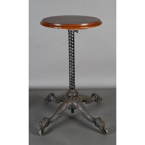 A Victorian cast iron extendable occasional table, the circu...