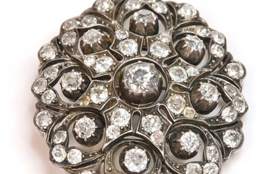 A Victorian diamond set oval cluster brooch/pendant, c.1880