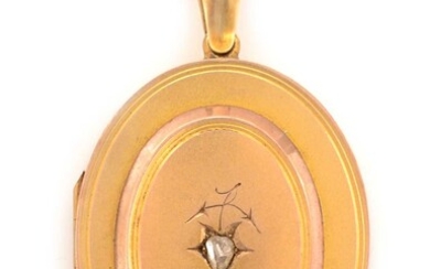 A Victorian yellow metal diamond set locket pendant