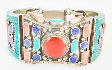 A WIDE NAVAJO CORAL LAPIS LAZULI AND TURQUOISE SET BANGLE
