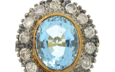 A blue paste and diamond cluster ring.