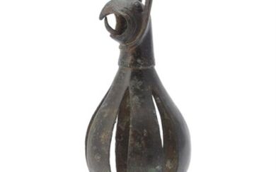 A bronze terminal with a griffin head