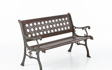 A cast-iron garden bench, later part of the 20th century.