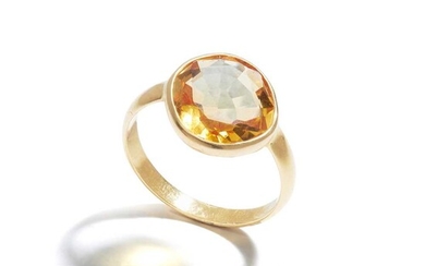 A citrine single-stone ring