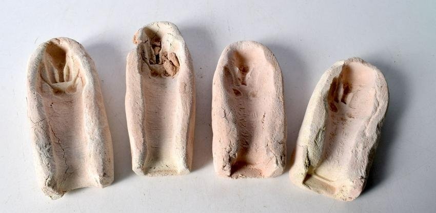 A collection of Egyptian Clay moulds. 21cm (4).