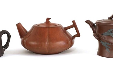 A collection of three Chinese Yixing zisha teapots