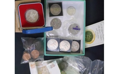 A collection of various coins including an Irish ten Shillin...