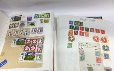 A collection of world stamp albums including QE2 joined £1 s...