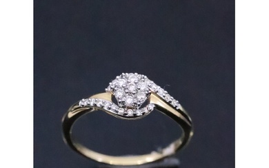 A diamond cluster ring set in 18ct gold, finger size M half