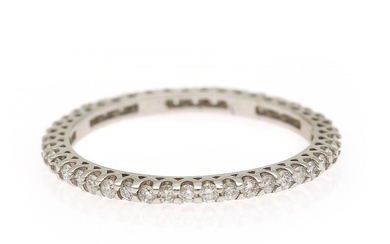 A diamond eternity ring set with numerous brilliant-cut diamonds totalling app. 0.45 ct., mounted in 18k white gold. Size 51.