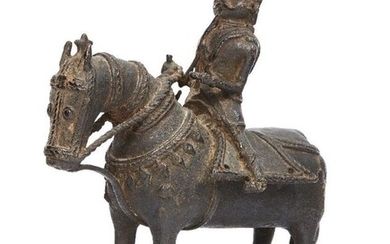 A large bronze figure on a horse,...