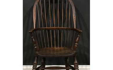 A late 19th century beech, ash and elm Windsor elbow chair, ...