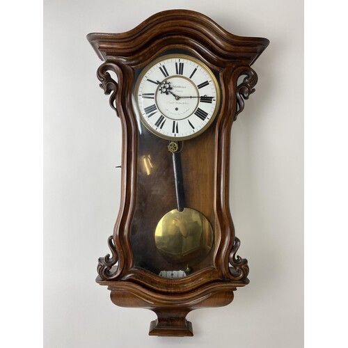 A late 19th century walnut 8 day Vienna regulator wall clock...