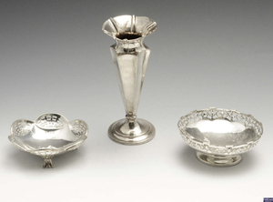 A late Victorian silver bud vase & two silver dishes. (3).
