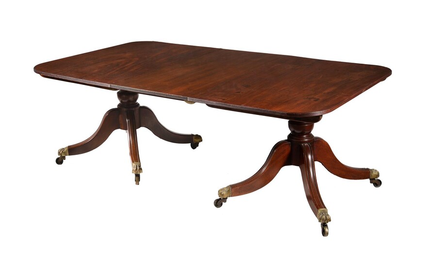 A mahogany twin pedestal dining table