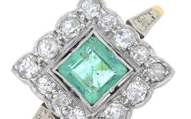 A mid 20th century 18ct gold emerald and old-cut diamond cluster ring.