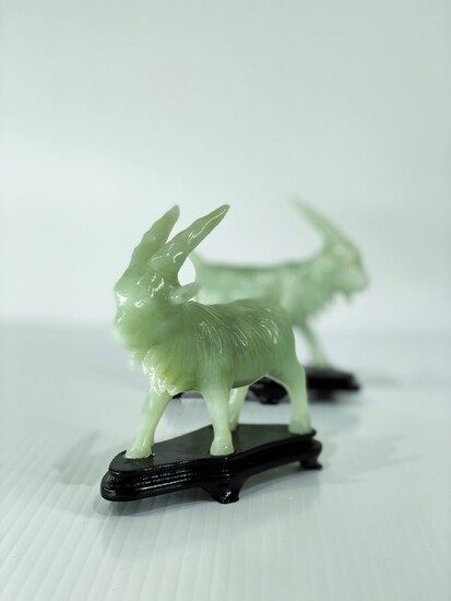 A pair of Chinese hand carved jade carving of...