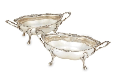A pair of George III silver dessert tureens, London, c.1768, W.H., of navette-shaped form with twin scroll handles and beaded rims, the shaped bodies raised on four foliate-shouldered scroll feet, 7cm high, 24.8cm long, total weight approx. 31.2oz...