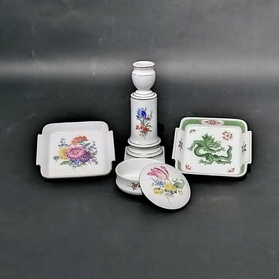 A pair of Meissen white and polychrome porcelain ashtrays