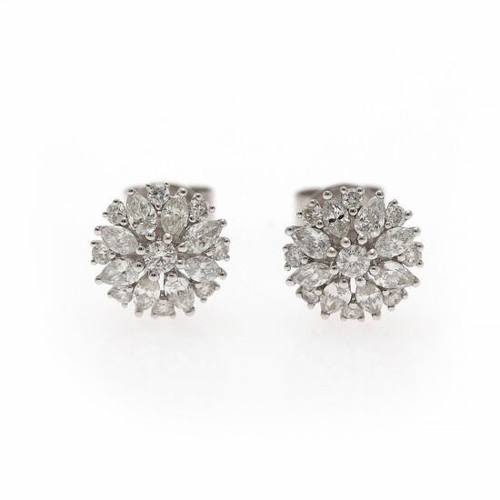 A pair of diamond ear studs each set with numerous diamonds weighing a total of app. 0.92 ct., mounted in 18k white gold. Diam. app. 9.5 mm. (2)
