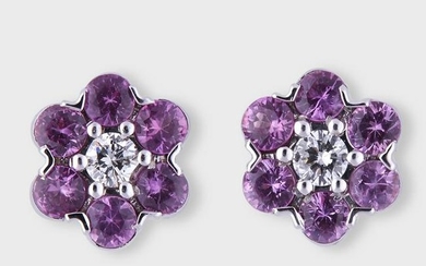 A pair of diamond, pink sapphire, and eighteen karat