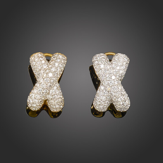 A pair of diamond-set gold earrings