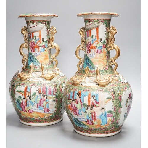 A pair of late 19th century Chinese famille rose vases, deco...