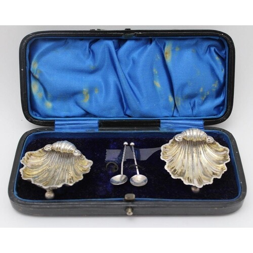 A pair of late Victorian silver salts of scallop shell form,...