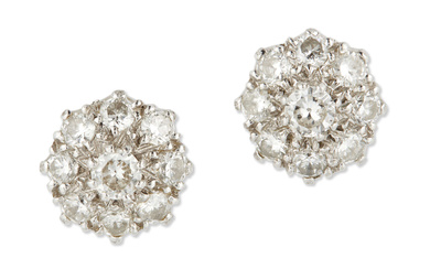 A pair of white gold diamond earrings, each composed of...