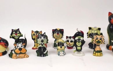A quantity of Lorna Bailey pottery cats, 20th century and later, to include; a money bank moulded as a sleeping cat, 17cm wide, and other similarly coloured pieces, signatures to bases, tallest 24cm high (13)