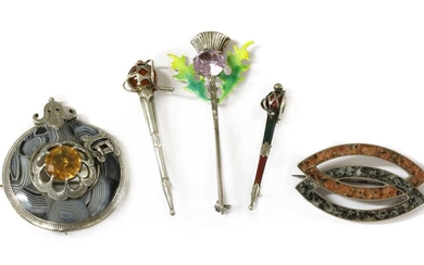 A quantity of Scottish silver brooches