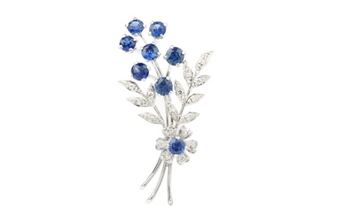 A sapphire and diamond floral spray brooch, set in 18ct...